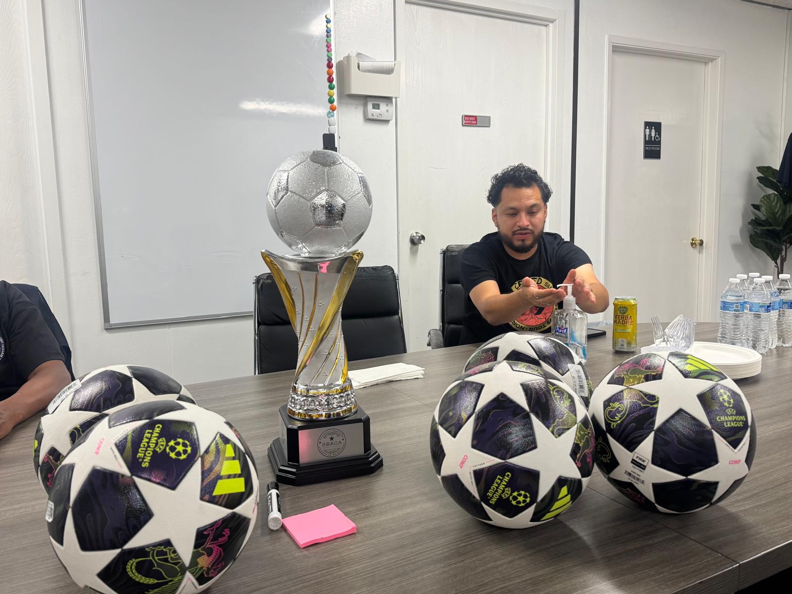 Tournament trophy and match balls